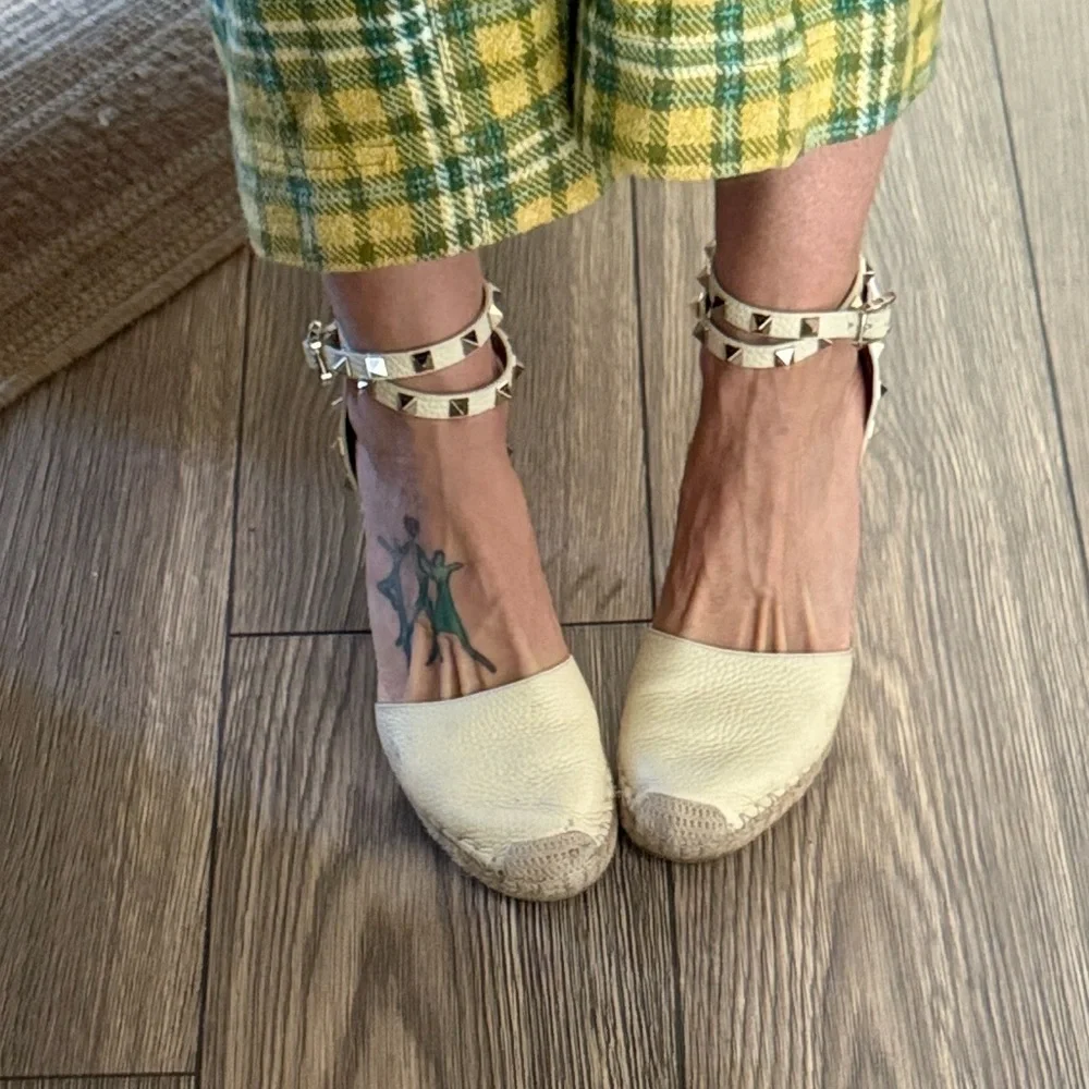 These are Valentino Garavani Rockstud textured-leather espadrille wedge heel